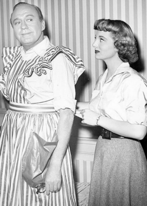 Jack Benny and his daughter Joan on the set of his TV show in 1954