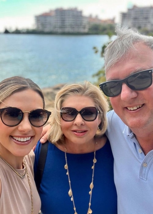 Lisa Boothe as seen in a selfie with her mother and father in February 2023, at Miami Beach, Florida