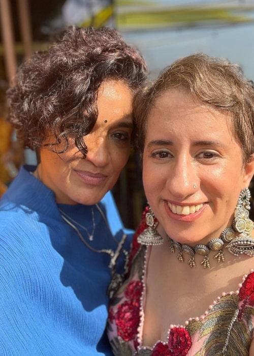 Sandhya Mridul (Left) smiling for a picture with Guneet Monga Kapoor in December 2022