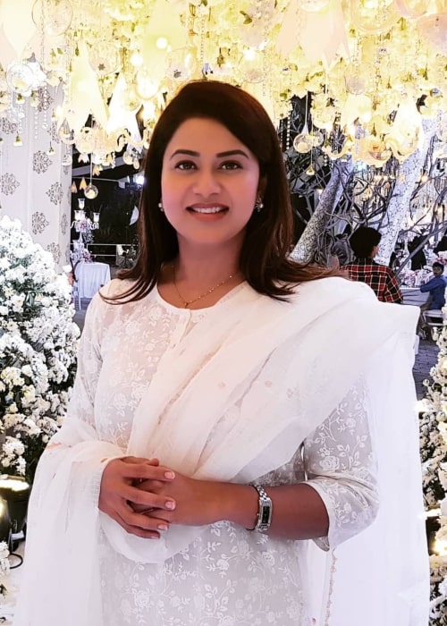 Sangeetha Krish as seen while smiling for a picture in April 2021