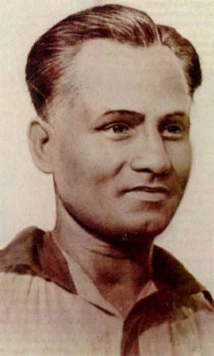 A black and white picture of Dhyan Chand