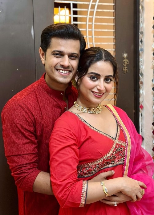 Aishwarya Sharma and Neil Bhatt posing for a Diwali picture in October 2022