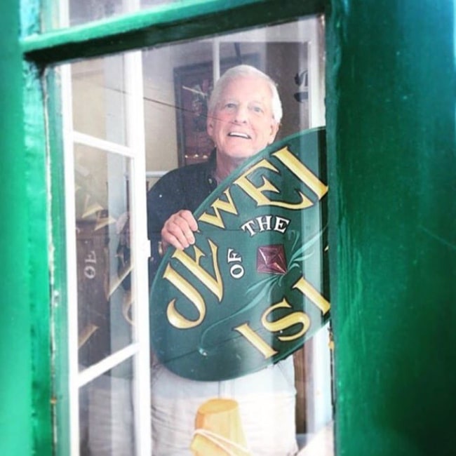 Gary Trainor as seen in a picture with his jewelry store sign in June 2016