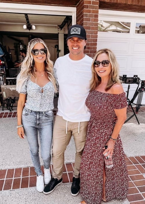 Joshua Hall a seen in a picture with his wife Christina and his mother in June 2022, in Newport Beach, California