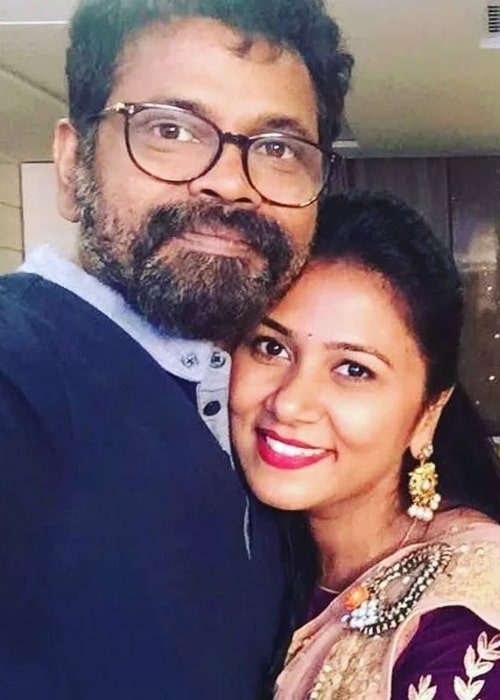 Sukumar taking a selfie with his wife