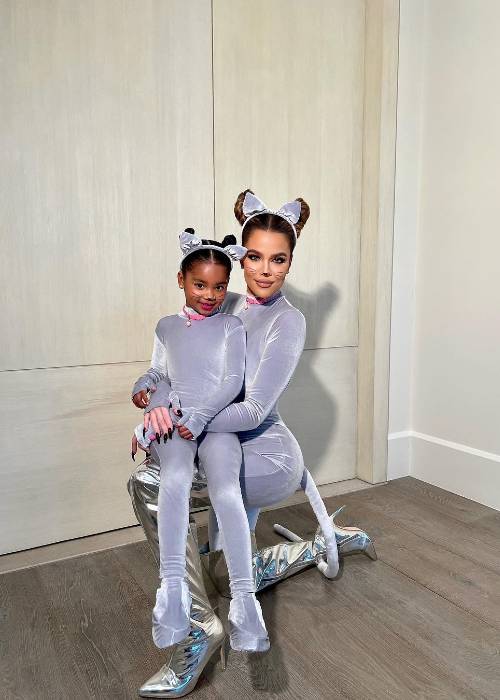 True Thompson as seen twinning with her mother in a grey kitty outfit in November 2022