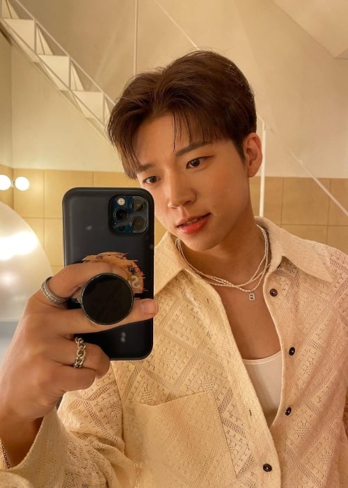 Woohyun as seen while taking a mirror selfie in January 2023