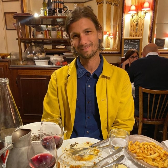 Andrew Lococo as seen while smiling for a picture in Paris, France in May 2022