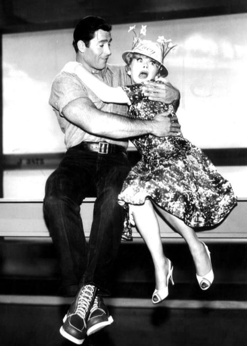 Clint Walker and Lucille Ball as seen in a publicity photo from the television program 'The Lucy Show'
