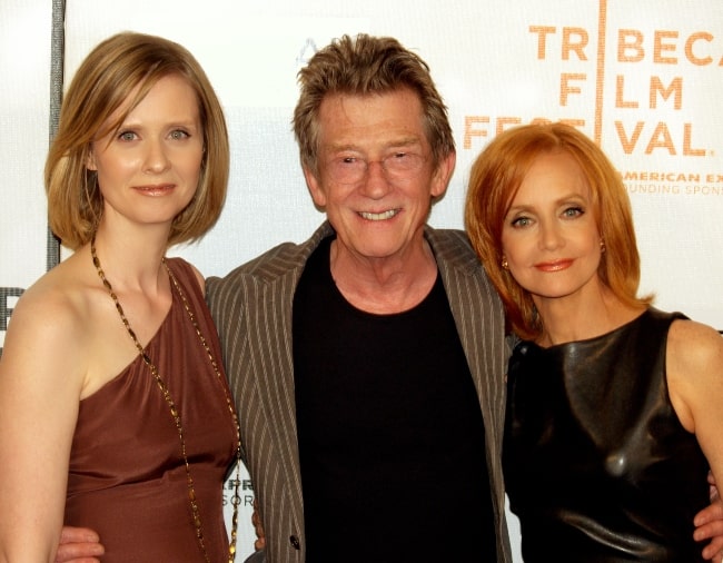 From Left to Right - Cynthia Nixon, John Hurt, and Swoosie Kurtz posing for the camera at the 2009 Tribeca Film Festival for the premiere of 'An Englishman in New York'