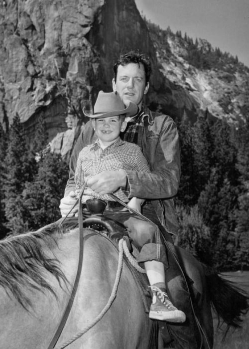 James Arness with his son, Rolf, in a publicity photo in 1959