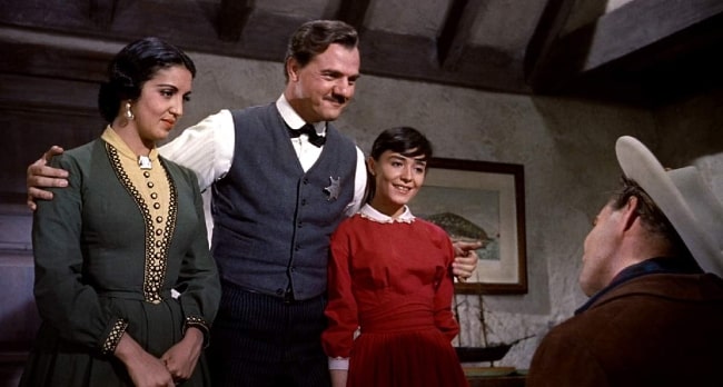 Karl Malden as seen while hugging actors Pina Pellicer (Right) and Katy Jurado (Left) while they stare at Marlon Brando in 'One-Eyed Jacks' (1961)