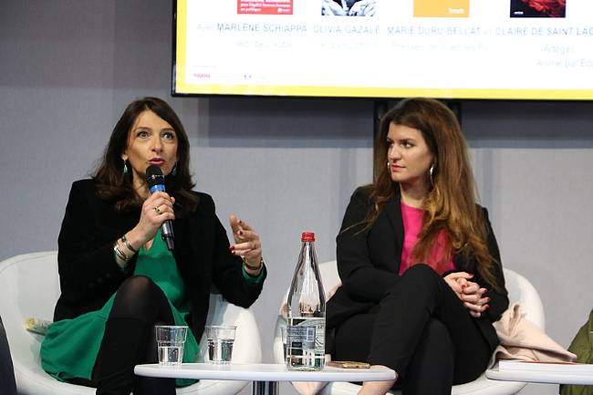 Olivia Gazalé as seen with Marlène Schiappa (right) at the Paris Book Fair in 2018