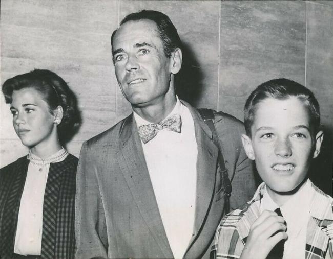 Peter (right) as photographed with his sister Jane and father in July 1955