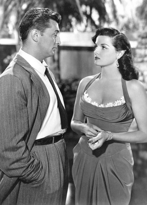 Robert Mitchum as seen with Jane Russell in 'His Kind of Woman' (1951)