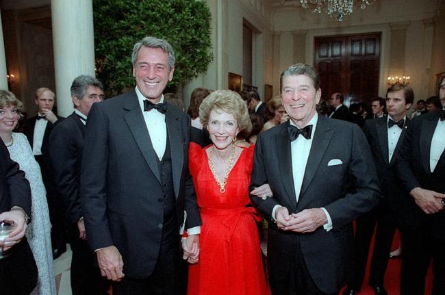 Rock Hudson as photographed with President Ronald Reagan and Nancy Reagan at the White House State Dinner in 1984
