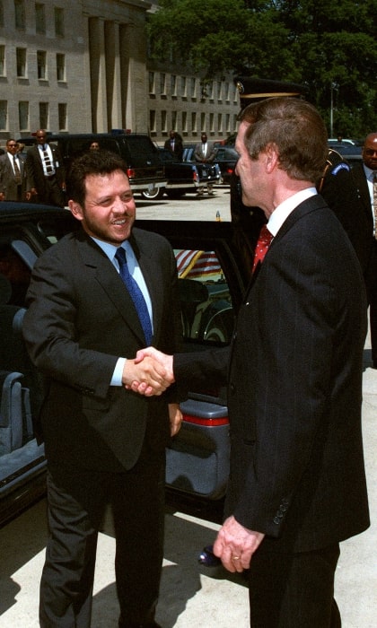 Abdullah II of Jordan (Left) pictured while being welcomed by U.S. Secretary of Defense William Cohen during his first visit to the United States as king in 1999