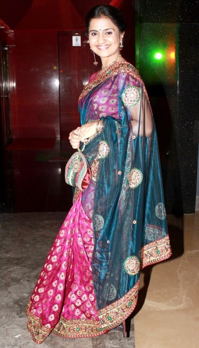 Amruta Subhash as seen while smiling for the camera at the screening of 'Masala' (2012) at PVR Phoenix
