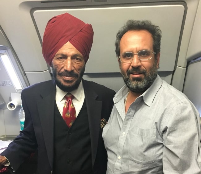 Anand L. Rai (Right) as seen in a picture with Milkha Singh