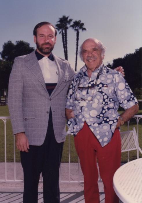 Frank Capra (right) and Alan Greenberg seen posing for a picture in La Quinta, California