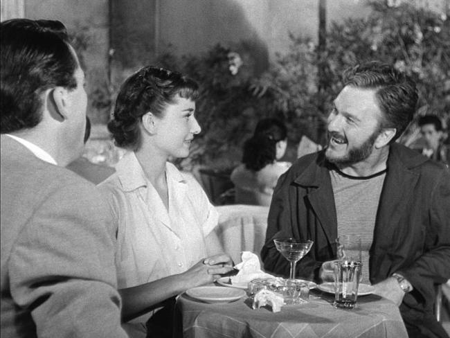 (From l to r) Gregory Peck, Audrey Hepburn, and Eddie Albert as seen in the 1953 film Roman Holiday