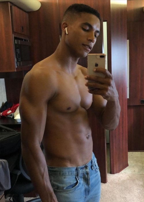 Greg Tarzan Davis as seen while showing his ripped physique in a mirror selfie in San Diego, California