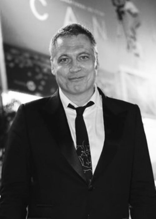 Holt McCallany as seen while smiling for a black-and-white picture in Cannes, French Riviera, France in 2019