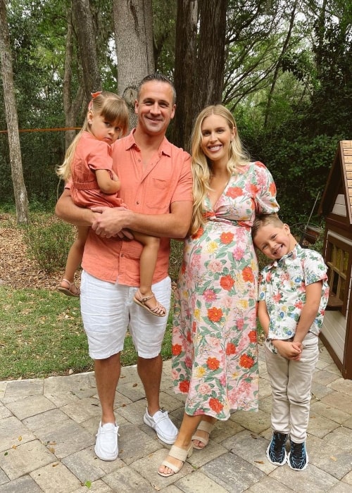 Kayla Rae Reid as seen in a picture with her husband Ryan Lochte and their children Caiden Zane and Georgia June that was taken in April 2023
