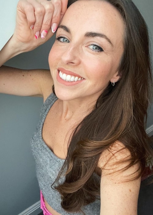 Louisa Lytton as seen while smiling in a selfie in May 2022