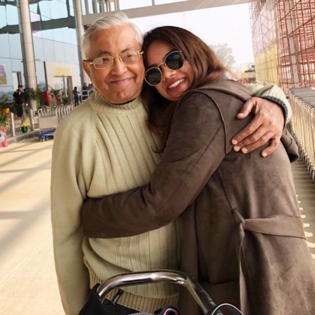 Nidhi Singh smiling in a picture with her father