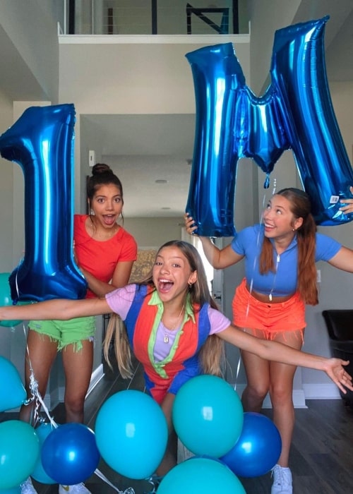 Raena Triple Charm as seen in a picture with her sisters Amalia and Gabriella in June 2022, celebrating 1 million followers