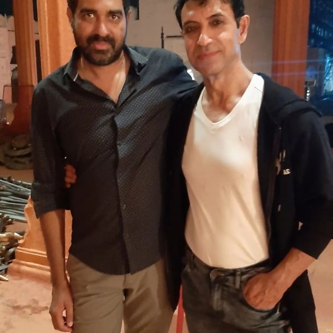 Rajiv Kachroo (Right) smiling for a picture alongside director Krish Jagarlamudi in February 2023