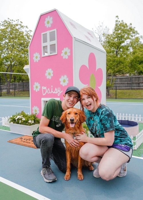 Scott Ellis as seen in a picture with his wife Keeley Elise and dog Daisy in front of their newly built dog house in May 2023