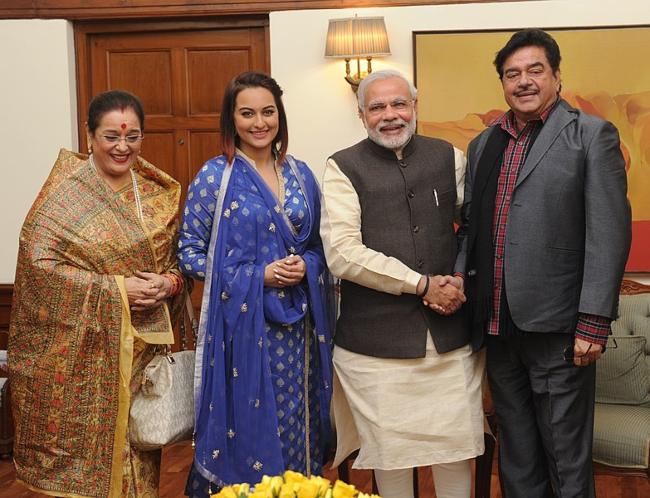 Shatrughan Sinha (right) as seen with his wife, daughter, and Prim Minister Narendra Modi in 2015