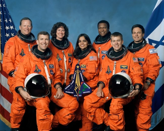 The crew (From Left - David Brown, Rick Husband, Laurel Clark, Kalpana Chawla, Michael Anderson, William McCool, and Ilan Ramon) of Space Shuttle Columbia mission STS-107 in October 2001