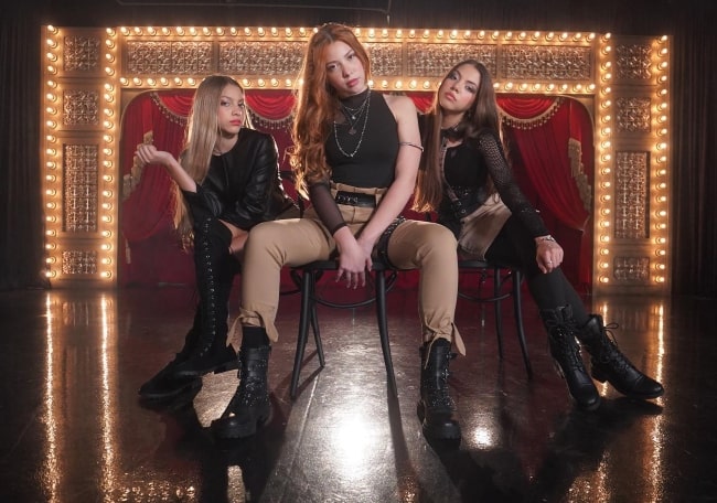 Triple Charm members (Left to Right) Gabriella, Amalia, and Raena in a picture for their single Tough Boy in April 2023
