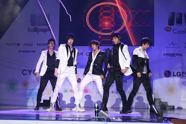 (From left to right) Members of MBLAQ Seungho, Thunder, Lee Joon, Mir, and G.O as seen performing onstage in 2010
