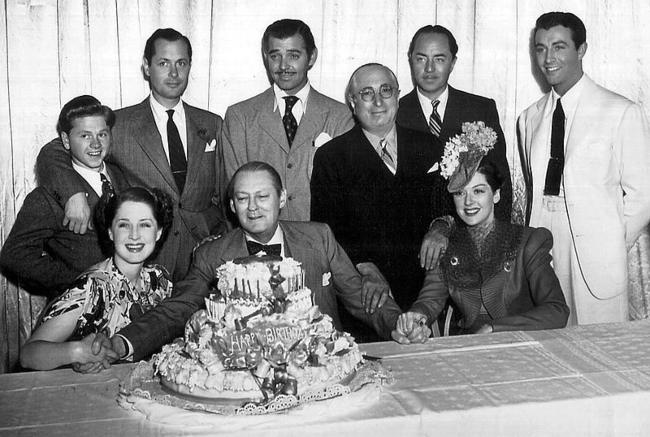 (From top left) Mickey Rooney, Robert Montgomery, Clark Gable, Louis B. Mayer, William Powell, Robert Taylor, Rosalind Russell, Lionel Barrymore, and Norma Shearer as seen in 1939