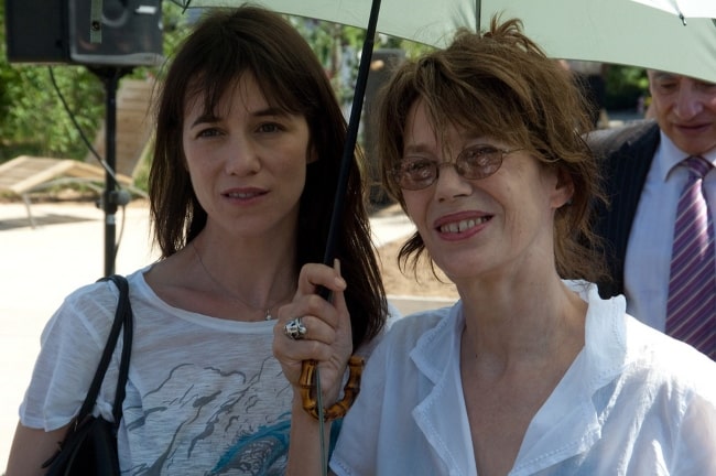 Jane Birkin (Right) smiling in a picture with her 2nd daughter Charlotte Gainsbourg in 2010
