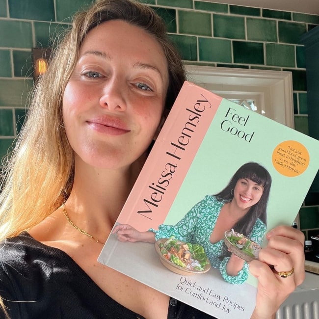 Laura Gallacher as seen in a selfie featuring a book by Melissa Hemsley in June 2022
