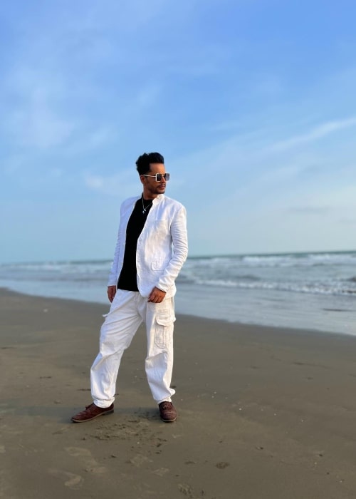 Shardul Pandit posing for a picture at a beach in Goa in June 2023