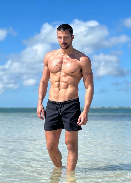 Simone Susinna as seen while posing for a shirtless picture in Miami Beach, Florida in February 2022