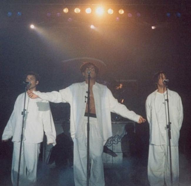 TJ Jackson as seen with other members of 3T performing the song I Need You in 1996
