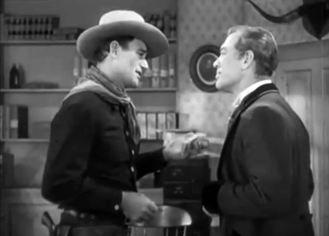 Ward Bond (Right) and John Wayne in 'Tall in the Saddle' (1944)