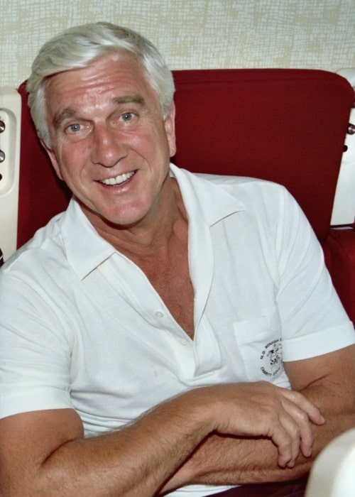 Actor Leslie Nielsen 1982 in a first class seat on United Airlines