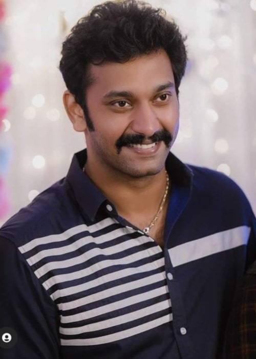 Arulnithi as seen while smiling in a picture in March 2021