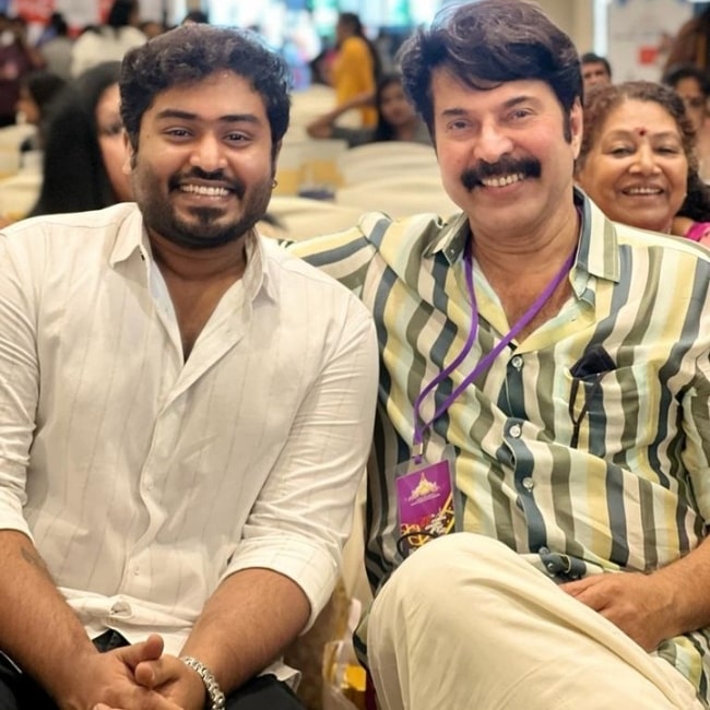 Gokul Suresh (Left) as seen while smiling for a picture along with Mammootty in an Instagram post in September 2022