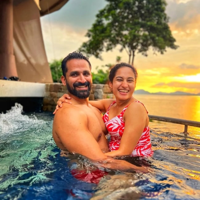 John Kokken as seen while smiling for a picture along with his wife Pooja Ramachandran in Phuket, Thailand in January 2023