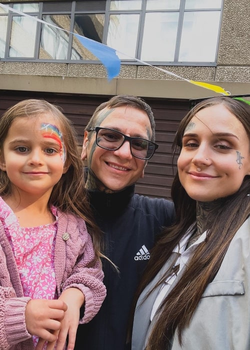 Monami Frost in a selfie with her daughter Gabby and husband Anrijs in July 2023
