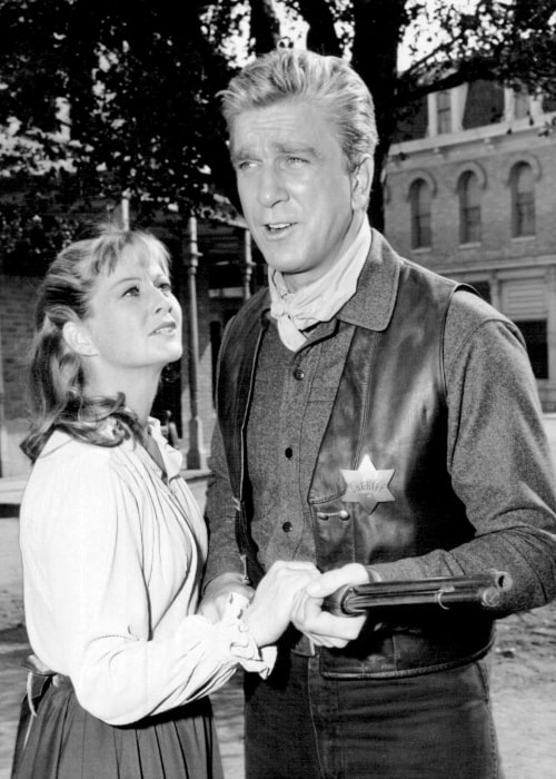 Photo of Leslie Nielsen and Nancy Malone as guest stars on Bonanza on Janaury 9, 1967